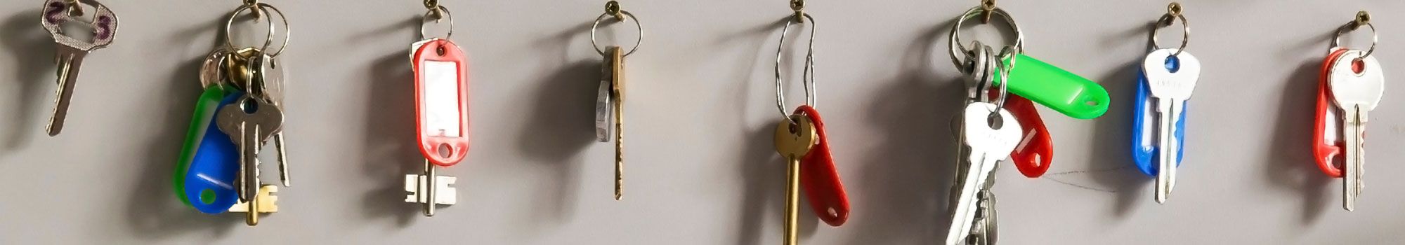 Row of property keys hanging on hooks